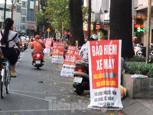 Nguoi dan rong ran mua bao hiem xe may, dan kinh doanh dao 'hot bac'-Hinh-4