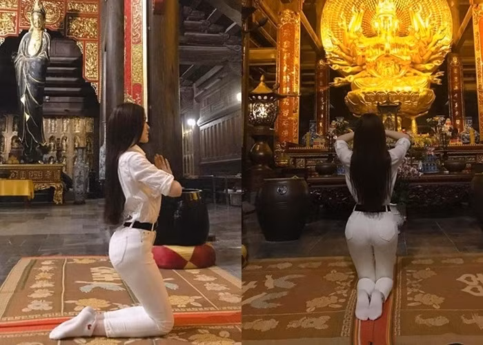 Tưởng chừng trang phục quần dài, sơ mi trắng của Thư Dung là vô cùng chỉn chu. Tuy nhiên, dáng ngồi và quỳ chắp tay cầu khấn của cô lại khiến cư dân mạng thấy khó chịu vì nhiều người cho rằng Thư Dung cố tình ưỡn người để khoe đường cong.