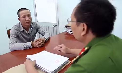 Dương Quang Hợp tại cơ quan điều tra. Dương Quang Hợp tại cơ quan điều tra.