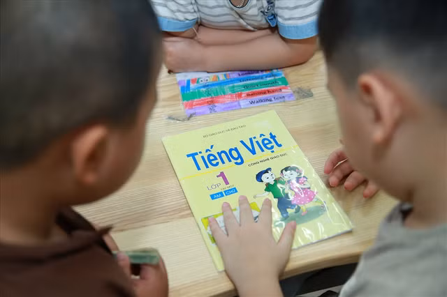 Bộ GD và ĐT lên tiếng về tài liệu đọc thơ theo ô vuông, tam giác - Hình 2 Bo GD va DT len tieng ve tai lieu doc tho theo o vuong, tam giac-Hinh-2