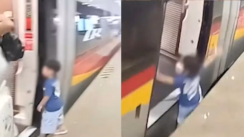 Bé trai may mắn thoát nạn khi rơi xuống khe tàu và sân ga