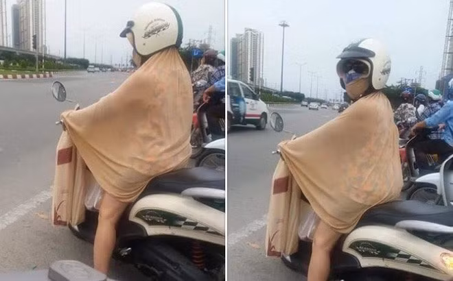 Người phụ nữ này khiên dân tình choáng váng khi lấy chiếc khăn mỏng quấn quanh người và mặt để chống nắng. Tuy nhiên độ dày của chiếc khăn khiến người ta hoài nghi về tác dụng của nó.