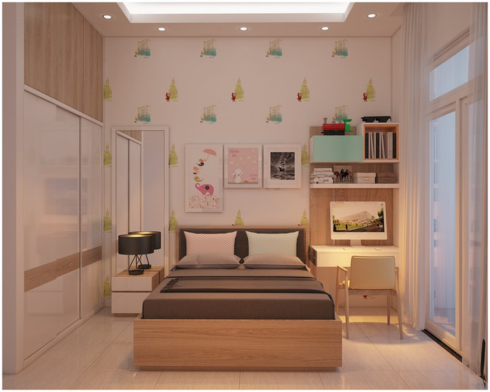 Giấy dán tường cùng kệ sách màu sắc được chọn theo sở thích của bé.