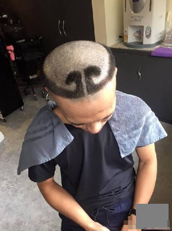 Cũng là chiếc vòng kim cô đội đầu nhưng thanh niên này lại để màu đen.