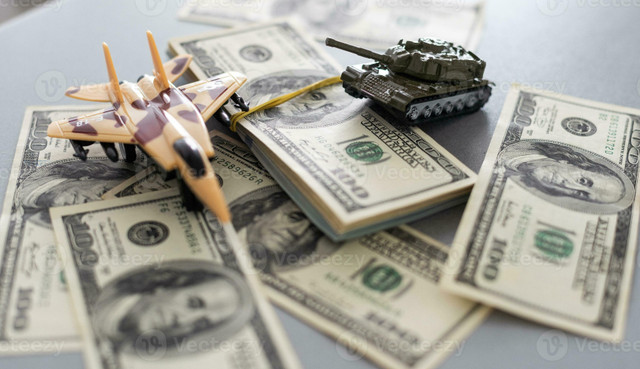 35201734-reservoir-sur-dollar-factures-le-concept-de-guerre-frais-militaire-depenses-photo.jpg