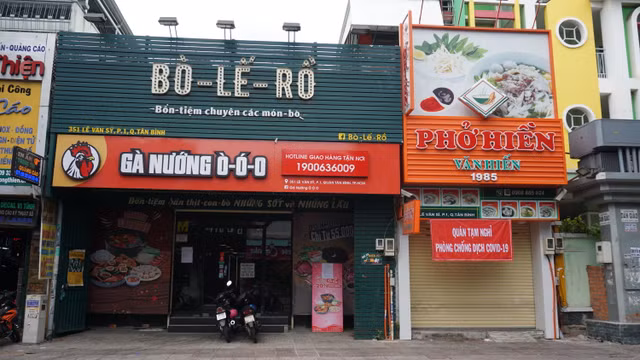 Nha hang, quan an tai TP HCM dong loat dong cua, ngung phuc vu tai cho-Hinh-2