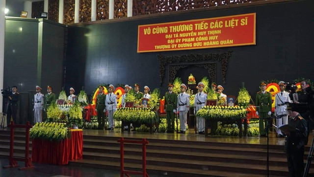 Hình ảnh lễ tang 3 công an hi sinh ở Đồng Tâm Hinh anh le tang 3 cong an hi sinh o Dong Tam