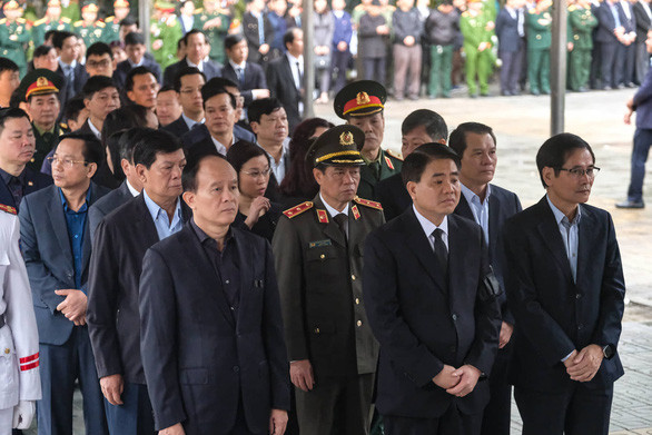 Hình ảnh lễ tang 3 công an hi sinh ở Đồng Tâm - Hình 9 Hinh anh le tang 3 cong an hi sinh o Dong Tam-Hinh-9
