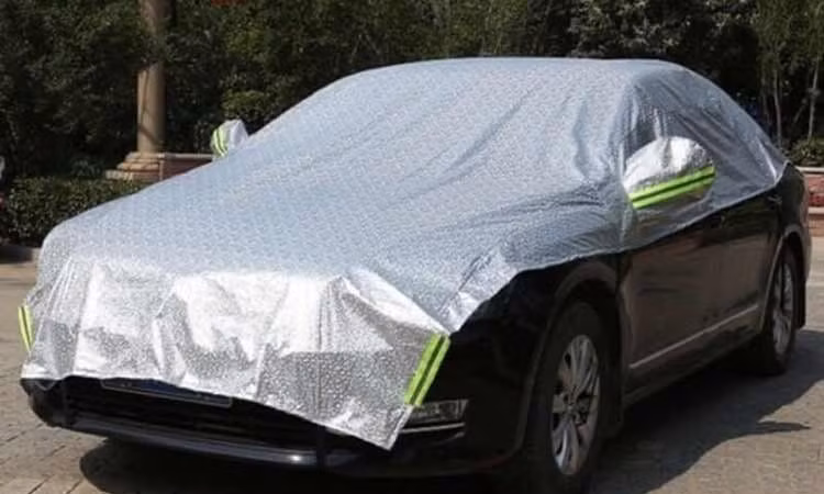 Dùng bạt phủ ôtô mùa nắng nóng - an toàn hay sai lầm?