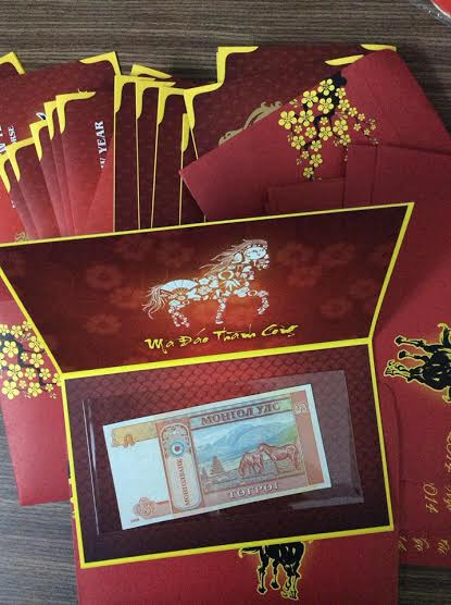 Đổi tiền lẻ giá cao nhộn nhịp giữa phố xá Hà Nội - Hình 3 Doi tien le gia cao nhon nhip giua pho xa Ha Noi-Hinh-3