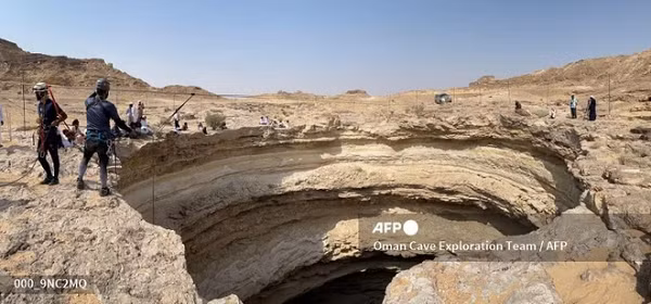 Bat ngo phat hien thu kinh khung trong 'gieng dia nguc'-Hinh-6