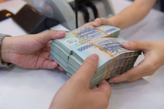 Dư nợ tín dụng tháng 2 giảm do ảnh hưởng bởi dịch Covid-19 Du no tin dung thang 2 giam do anh huong boi dich Covid-19