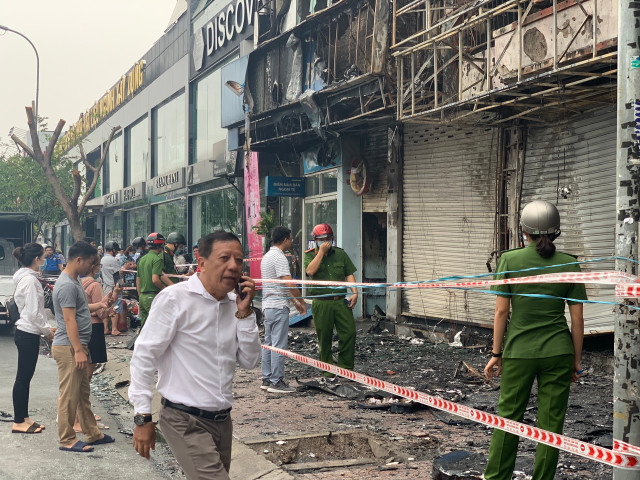 Xác định nghi can gây cháy chi nhánh ngân hàng Eximbank cùng nhà dân ở Sài Gòn - Hình 3 Xac dinh nghi can gay chay chi nhanh ngan hang Eximbank cung nha dan o Sai Gon-Hinh-3