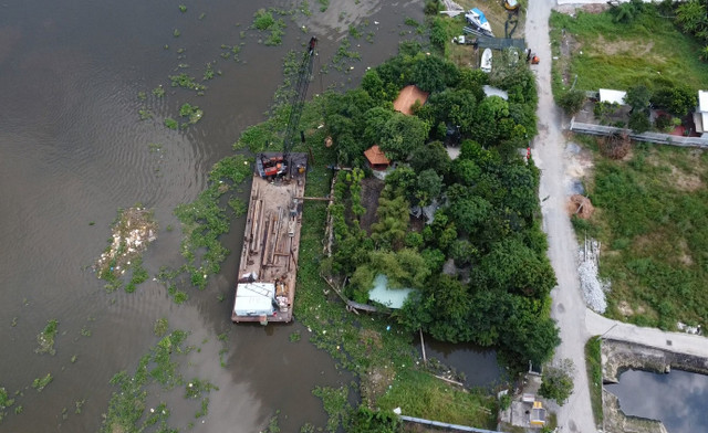 Quận 12 (TP HCM): Ngang nhiên ép cọc, xây kè lấn sông Sài Gòn? - Hình 6 Quan 12 (TP HCM): Ngang nhien ep coc, xay ke lan song Sai Gon?-Hinh-6