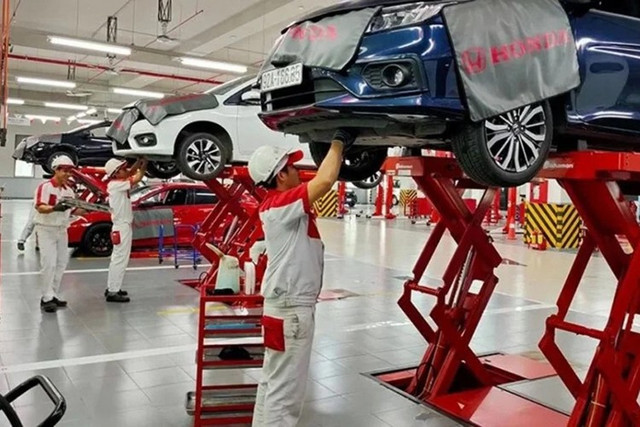 Honda kiểm tra và miễn phí thay dầu cho xe hư hại do mưa lũ. 222.jpg