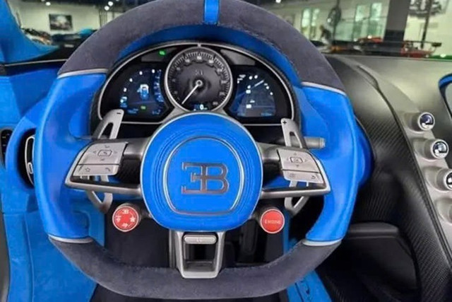Rõ ràng đại lý đang rao bán chiếc siêu xe Bugatti Divo này rất tham lam khi muốn chốt lời gần 10 triệu USD (khoảng 261 tỷ đồng). 3-5217.jpg