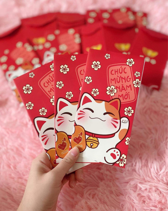 Thị trường Tết Quý Mão 2023: Xuất hiện những món quà độc lạ hình mèo - Hình 4 Thi truong Tet Quy Mao 2023: Xuat hien nhung mon qua doc la hinh meo-Hinh-4