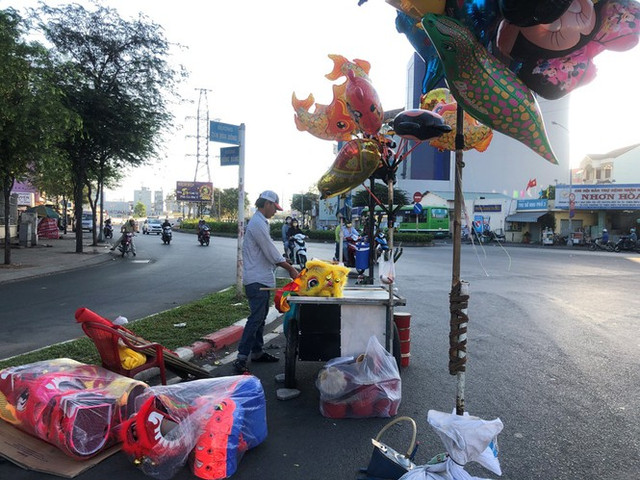 Sài Gòn đẹp dịu dàng sáng mùng 1 tết - Hình 21 Sai Gon dep diu dang sang mung 1 tet-Hinh-21