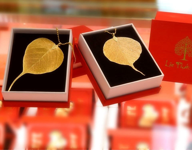 Tượng vàng Phu Thê và loạt sản phẩm độc đáo ngày Vía Thần Tài - Hình 3 Tuong vang Phu The va loat san pham doc dao ngay Via Than Tai-Hinh-3