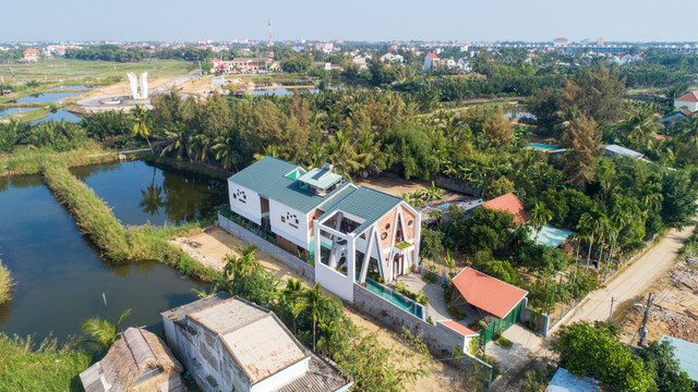 Kiến trúc lấy cảm hứng từ cây dừa trong biệt thự ở Hội An Kien truc lay cam hung tu cay dua trong biet thu o Hoi An