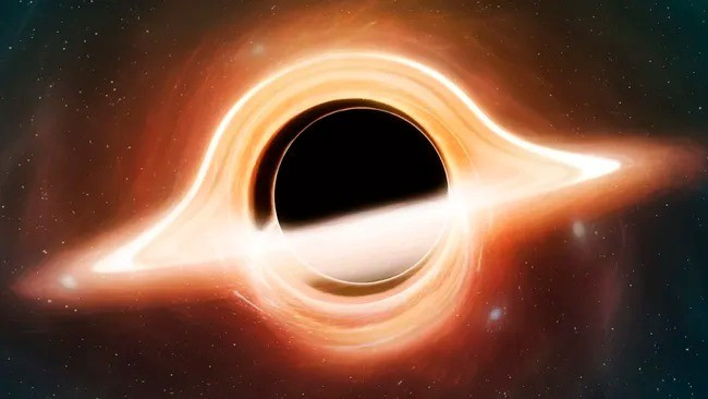 Các nhà khoa học gọi việc hố đen siêu khổng lồ "ngấu nghiến" một ngôi sao là một sự kiện gián đoạn thủy triều (tidal disruption event - TDE). Ảnh: MARK GARLICK/SCIENCE PHOTO LIBRARY via Getty Images.