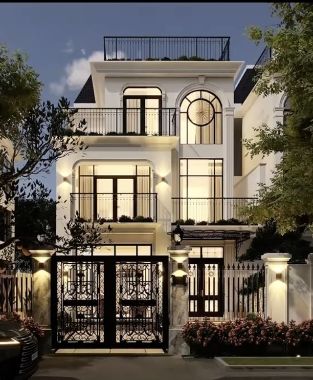 Biệt thự mới của vợ chồng Thành Chung thiết kế theo phong cách hiện đại, tông màu trắng – ghi chủ đạo kết hợp hệ cửa kính lớn giúp tối ưu ánh sáng tự nhiên. Ảnh: FBNV biet-thu2.jpg