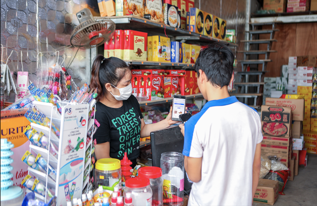 Meo giup chu tiem tap hoa kiem bon dip tien Tet