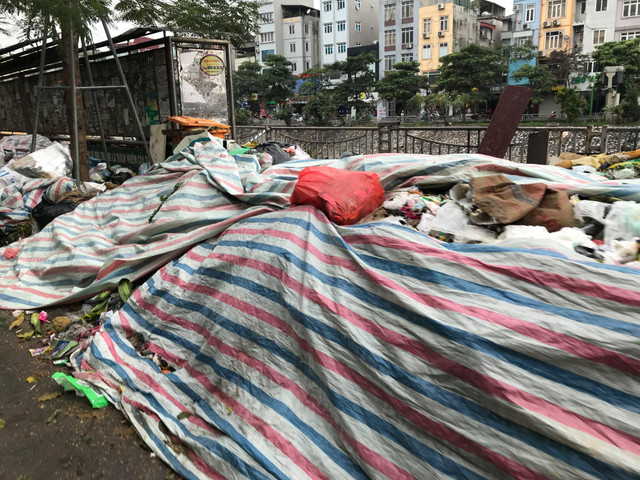 Hà Nội ra sao sau khi bãi rác Nam Sơn hoạt động trở lại? - Hình 9 Ha Noi ra sao sau khi bai rac Nam Son hoat dong tro lai?-Hinh-9
