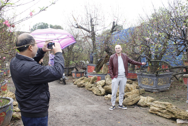 Anh: Nguoi dan trong dao Van Tao tat bat cho Tet Ky Hoi 2019-Hinh-10