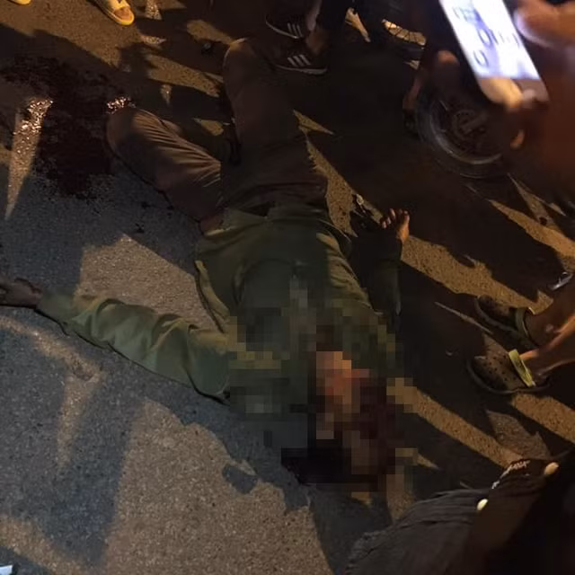 Tin moi: nghi van xe bien xanh gay tai nan roi bo chay-Hinh-2