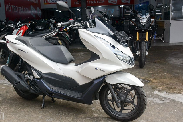 Honda PCX e:HEV về Việt Nam có giá gần 100 triệu đồng - Hình 12 Honda PCX e:HEV ve Viet Nam co gia gan 100 trieu dong-Hinh-12