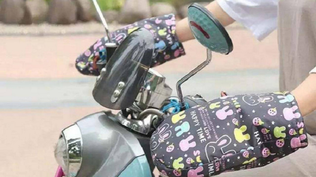 Những phụ kiện chống rét dành cho người đi xe máy - Hình 4 Nhung phu kien chong ret danh cho nguoi di xe may-Hinh-4
