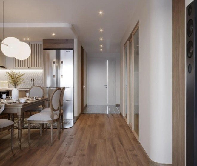 Căn hộ sử dụng tông màu trung tính gồm trắng kem, be và nâu gỗ, tạo cảm giác thư thái. Ảnh: chụp màn hình