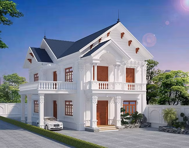 Mẫu nhà 2 tầng cổ tiền sử dụng mái thái như một điểm nhấn khiến nó không khác tòa lâu đài trắng. Ảnh: Xaydungsgp.