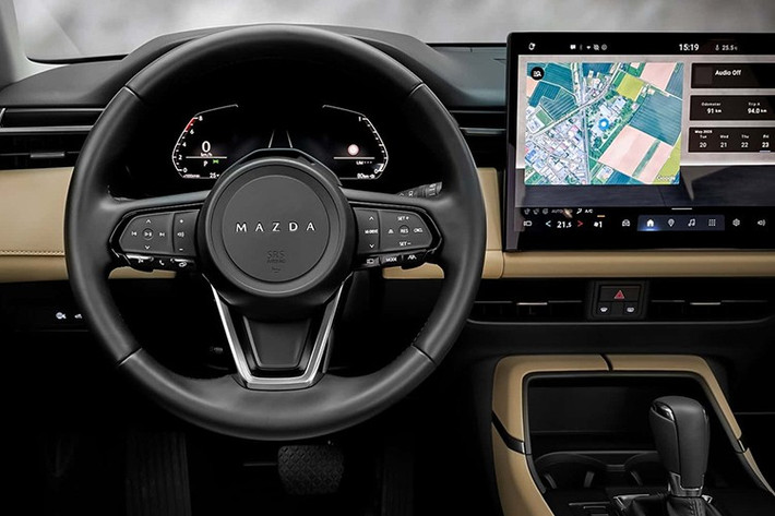 Khoang nội thất thay đổi rõ rệt theo hướng tối giản nhưng hiện đại. Bảng đồng hồ kỹ thuật số kích thước 10,25 inch kết hợp màn hình trung tâm lớn đặt nổi. Với thiết kế mới, CX-5 tạo trải nghiệm cao cấp hơn trước, khác biệt so với phong cách truyền thống thiên về tiện dụng của thế hệ cũ.