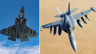 F-35C (trái) và EA-18G của Hải quân Mỹ. (Ảnh: M. Jackson/USN)