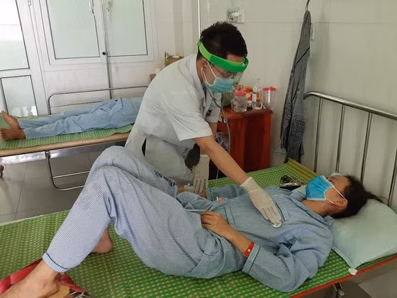 Thêm 3 người Quảng Nam nhập viện sau khi ăn pate Minh Chay Them 3 nguoi Quang Nam nhap vien sau khi an pate Minh Chay
