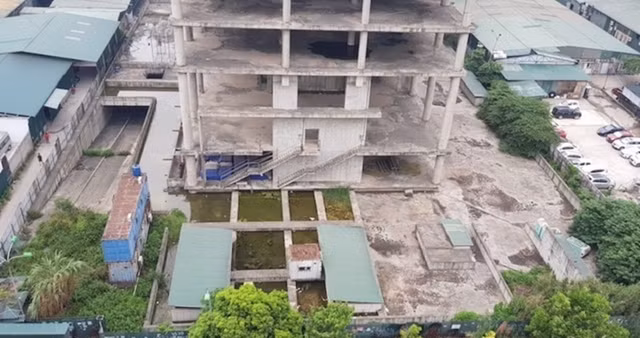 Nhếch nhác tòa tháp nghìn tỷ của Vicem giữa đất vàng Hà Nội - Hình 6 Nhech nhac toa thap nghin ty cua Vicem giua dat vang Ha Noi-Hinh-6