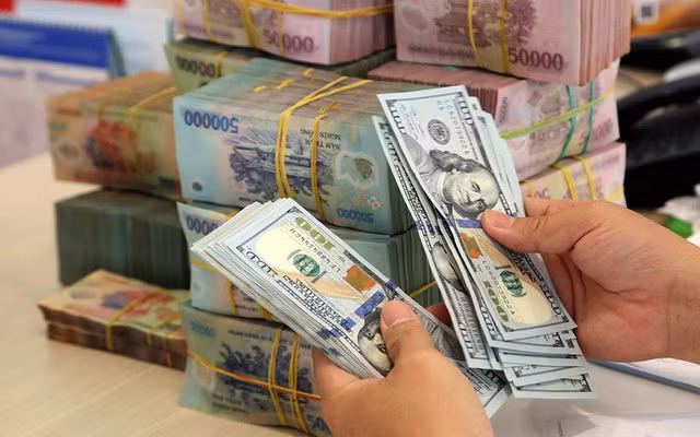 NHNN giảm giá mua USD kỳ hạn 6 tháng xuống 22.975 đồng NHNN giam gia mua USD ky han 6 thang xuong 22.975 dong
